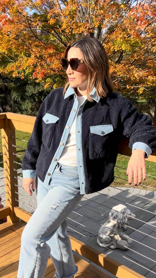 Navy blue sherpa jacket with denim trim