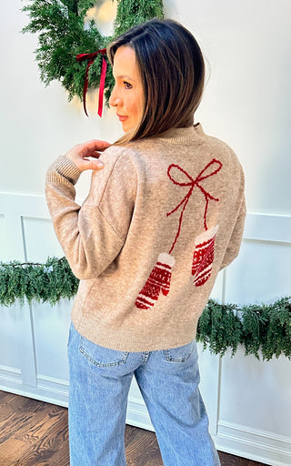 Women’s oat sweater with red mittens detail, front chest and large back graphic